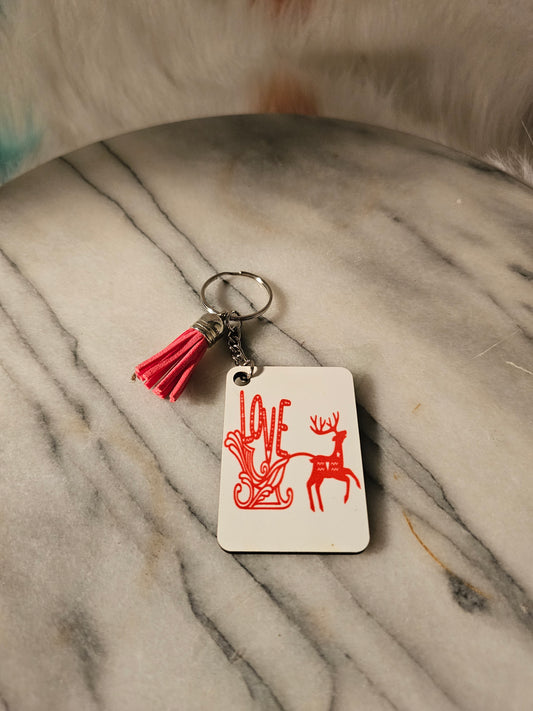 Sublimation rectangle Rudolph and slide Christmas Keychain.