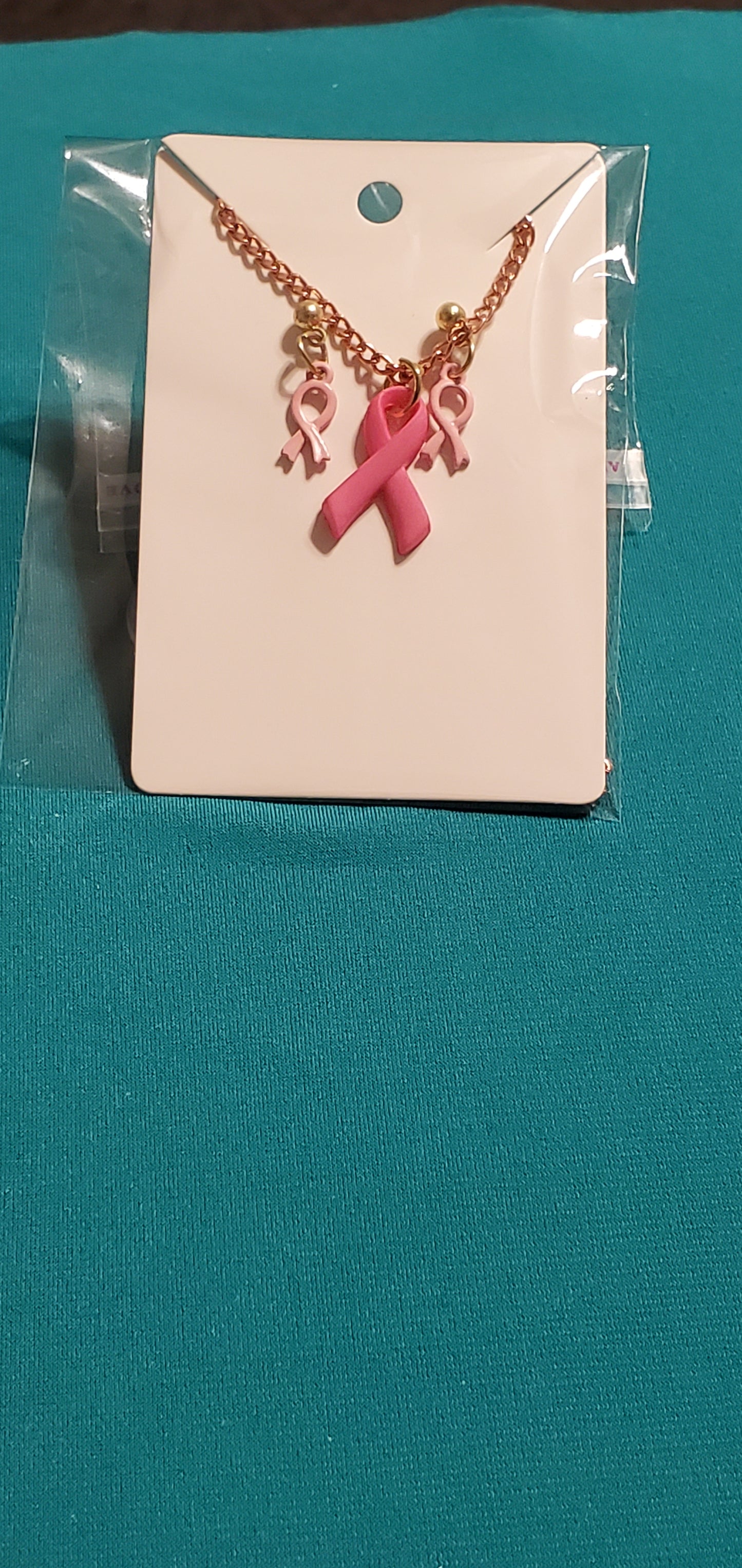 Pink cancer free gold plated earrings