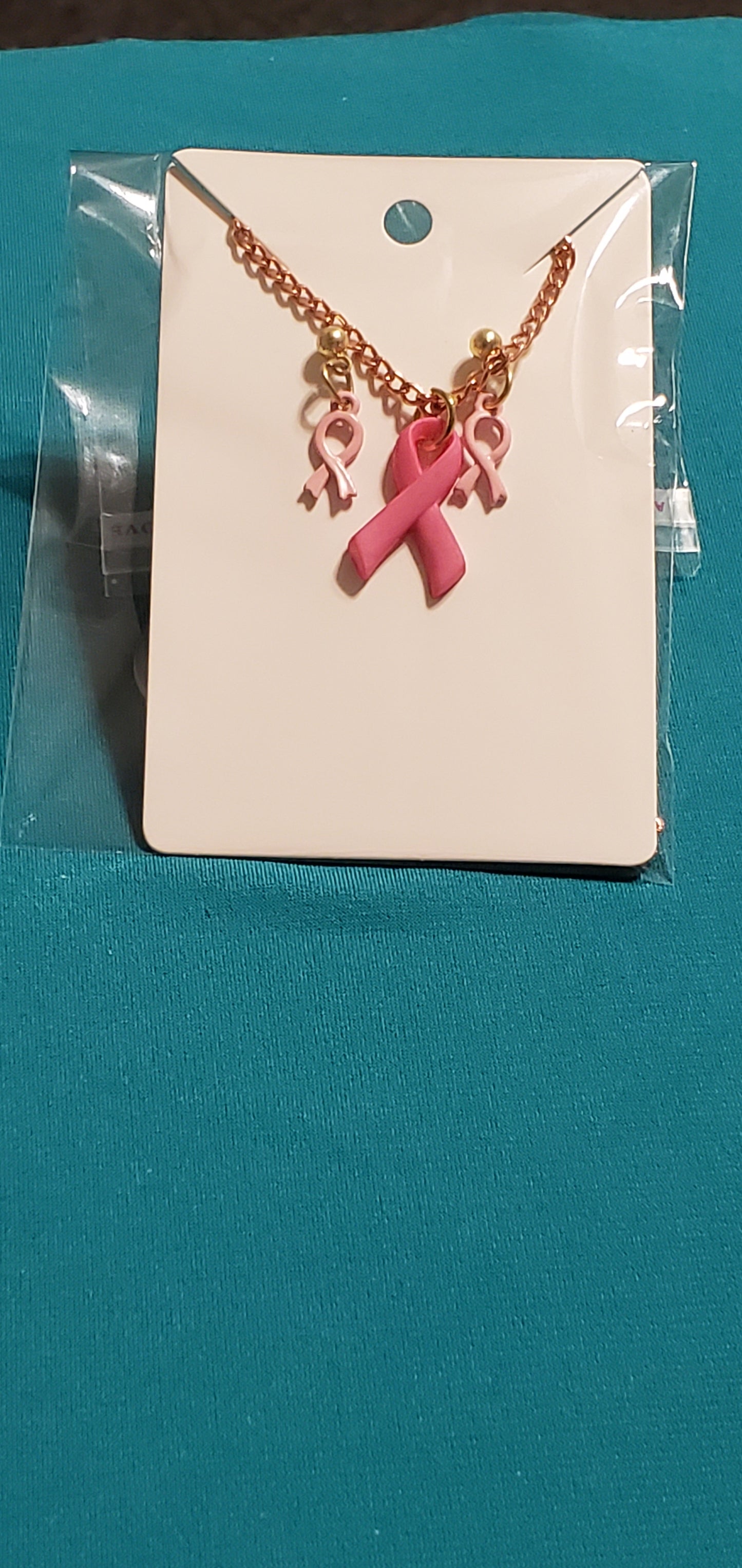 Pink cancer free gold plated earrings